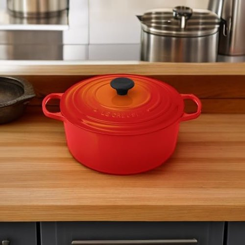 Le Creuset Enameled Cast Iron Dutch Oven - 7.25 Qt, Vibrant Flame Color for Perfect Cooking