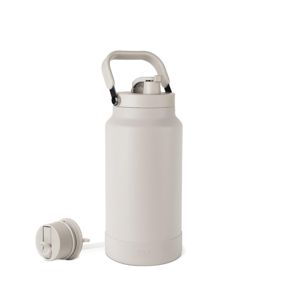 Simple Modern Trek Pivot | Half Gallon Water Bottle Jug with Handle & Boot | Interchangeable Straw & Chug Lids | Large Insulated Stainless Steel | Sports Camping Outdoors | 64oz, Almond Birch