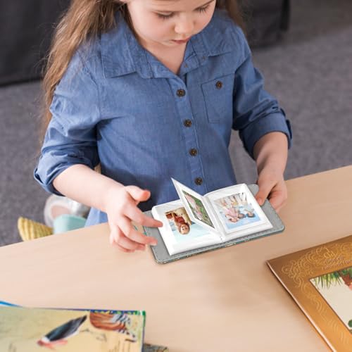 Fintie Mini Photo Album for 2x3 Inch Photos - 52 Pocket Travel Memory Book