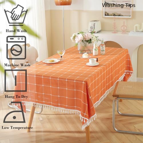 Rakila Rustic Checkered Cotton Linen Tablecloth - Orange 55x102 Inches, Waterproof, Tassel Decor for Kitchen & Dining, 10-12 Seats