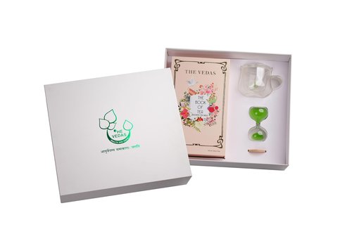 The Vedas Tea chest Premium Tea gift set | 48 handstitched cotton teabags | 12 flavours | 1 The Vedas Branded Mug with Infuser | 1 Sand clock specially designed for our teas | 1 Coaster