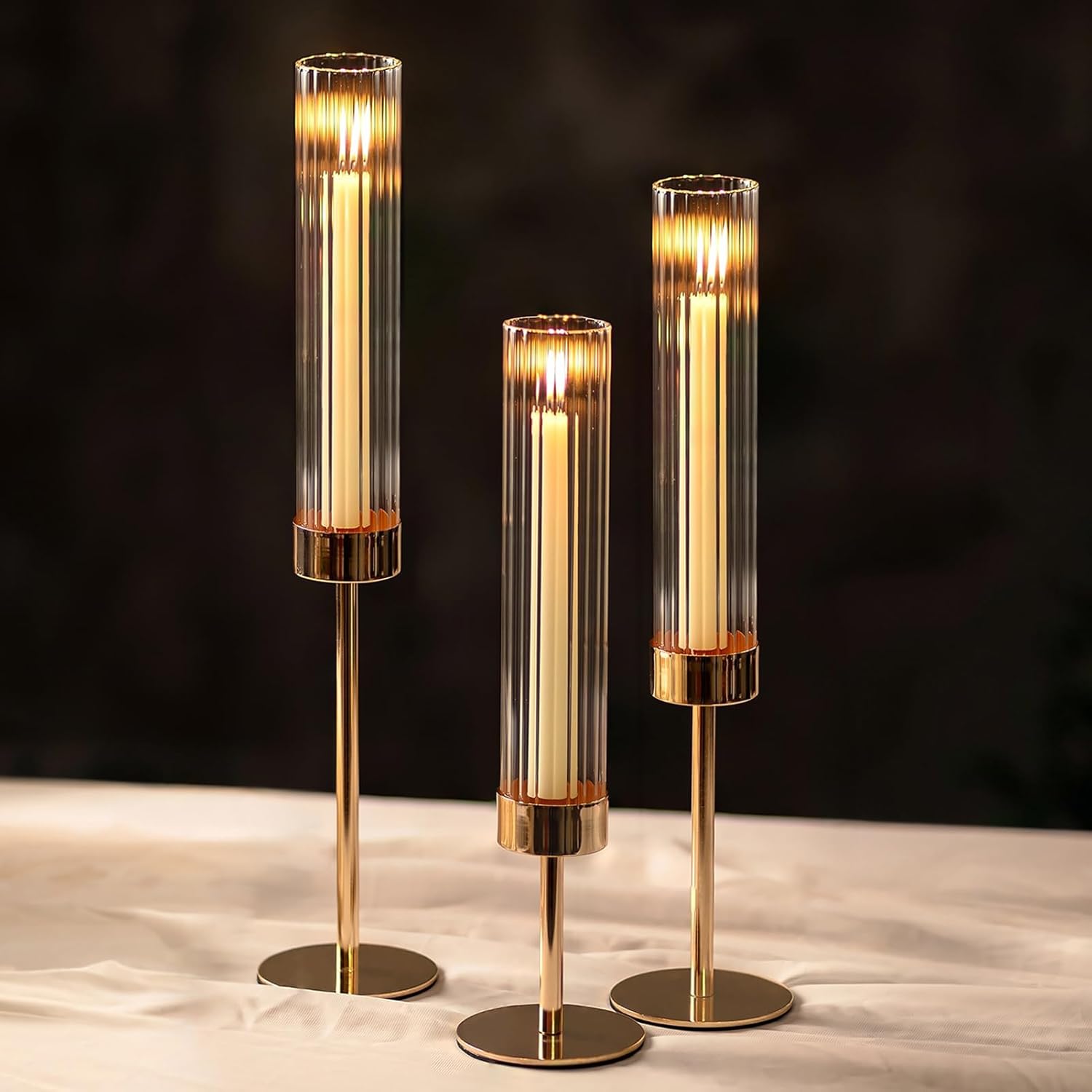 NUPTIO Tall Candlestick Holders - Elegant Hurricane Candle Holders with Ribbed Glass Sleeve | Set of 3 Gold Metal for Table & Fireplace Decor