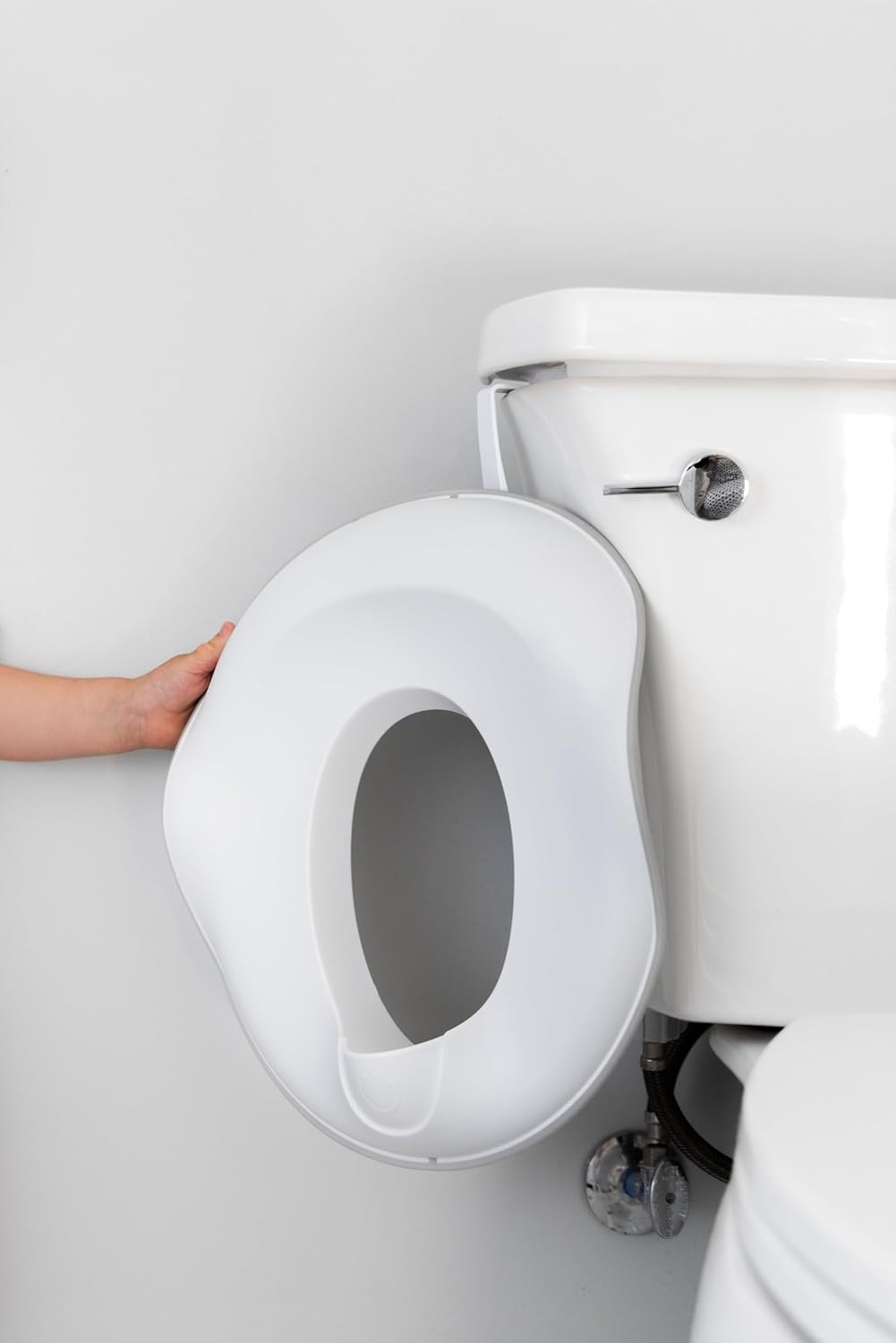 Ubbi Adjustable Toilet Trainer for Toddlers - Built-In Handles & Bonus Potty Hook | Gray