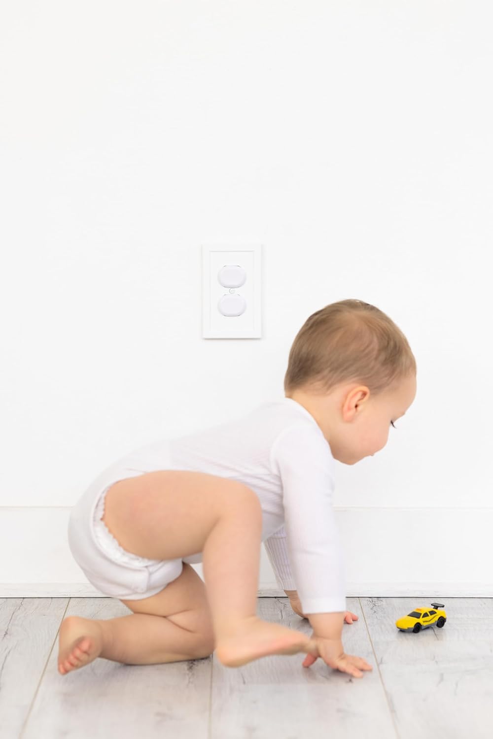 Ubbi Safety Bundle - Complete Baby Proofing Set with 36 Outlet Covers, 16 Corner Protectors & 2 Pinch Guards | White