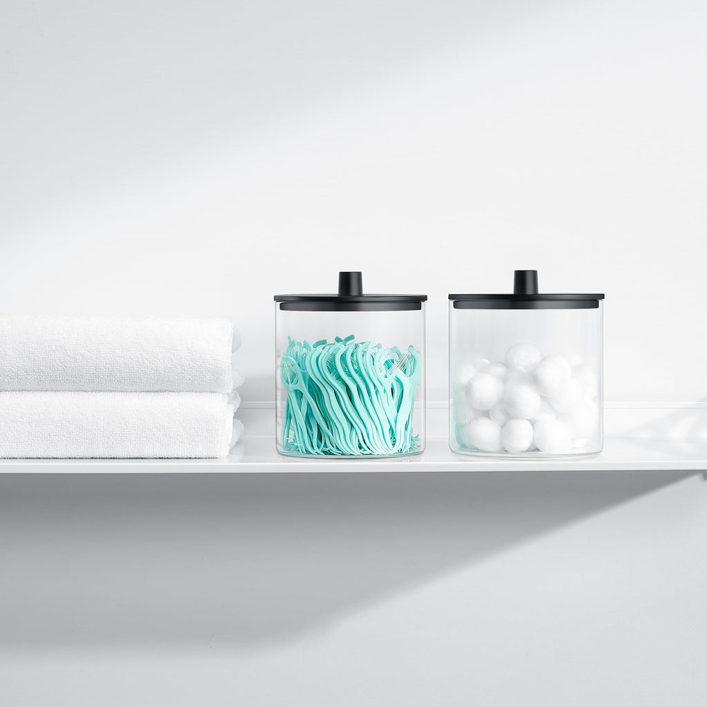 TIPGO Glass Qtip Holder Dispenser - 24 oz Clear Canister Jar, Bathroom Vanity Storage Organizer for Cotton Swabs, Pads, Floss Picks, Small Containers for Makeup Storage (Black)