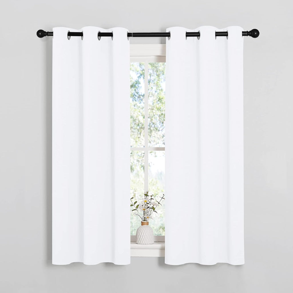NICETOWN Light Blocking Curtain Panels - Easy-Care Solid Grommet Drapes for Bedroom | 34x54 Inches, White (2 Panels)