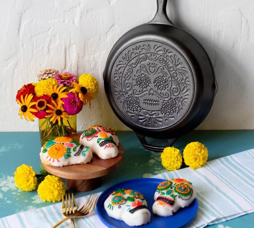 Lodge 10.25 Inch Pre-Seasoned Cast Iron Skillet - Versatile Sugar Skull Design - Ideal for Oven, Stove, Grill, or Campfire