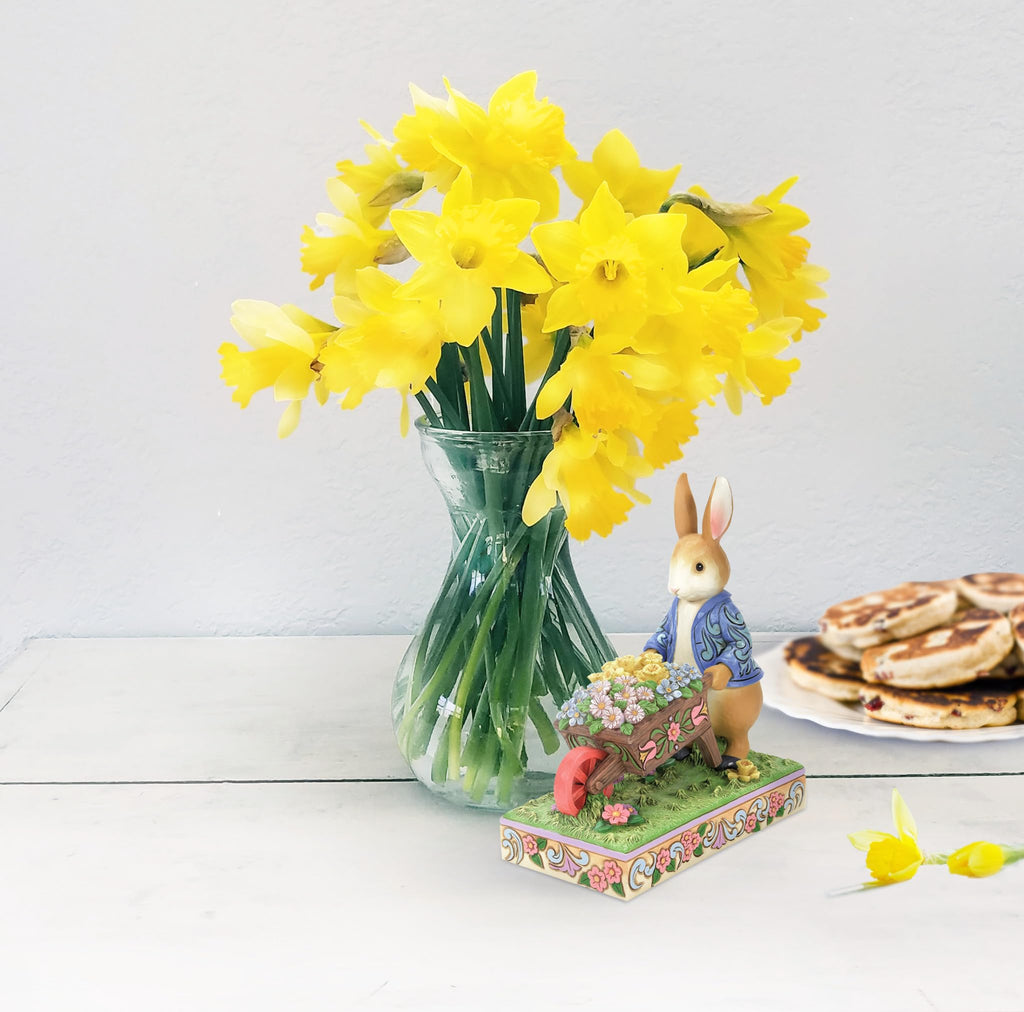 Enesco Beatrix Potter by Jim Shore Peter Rabbit with Wheelbarrow of Flowers Figurine, 6.3 Inch, Multicolor