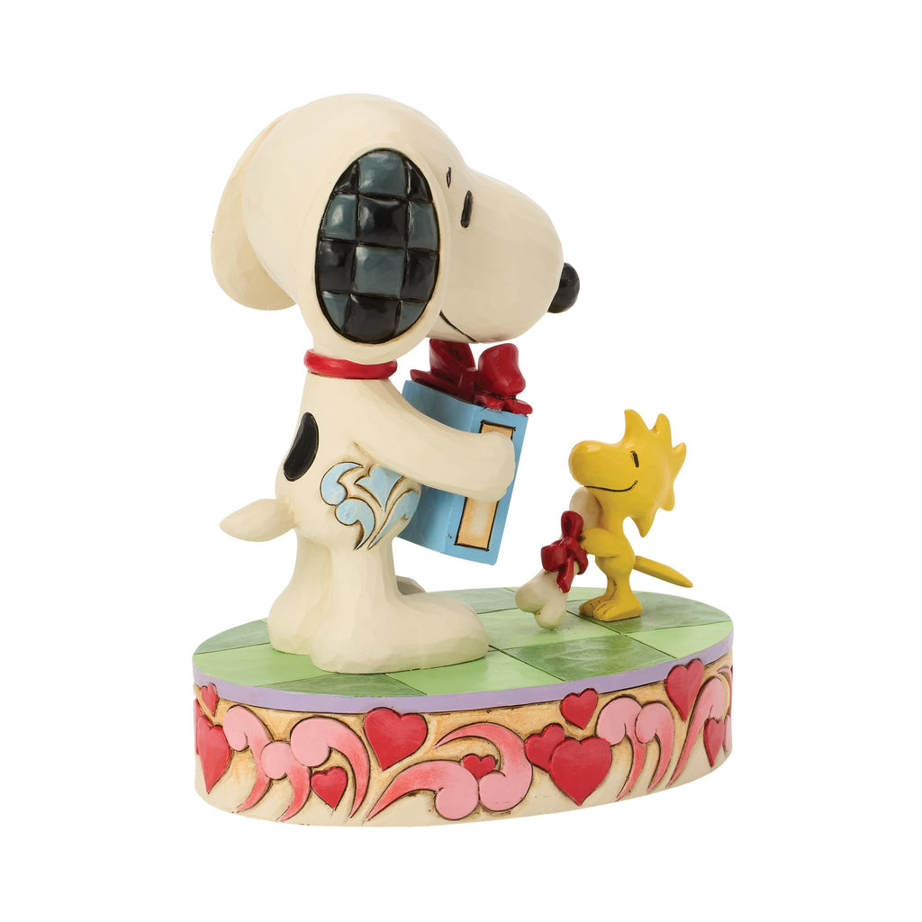 Enesco Peanuts by Jim Shore Snoopy and Woodstock with Gifts Figurine, 5.31 Inch, Multicolor