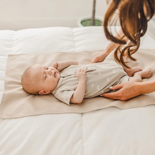 Konssy Faux Leather Baby Changing Mat - Waterproof & Portable Diaper Changing Pad | 30 x 17 Inches (Brown/Beige)