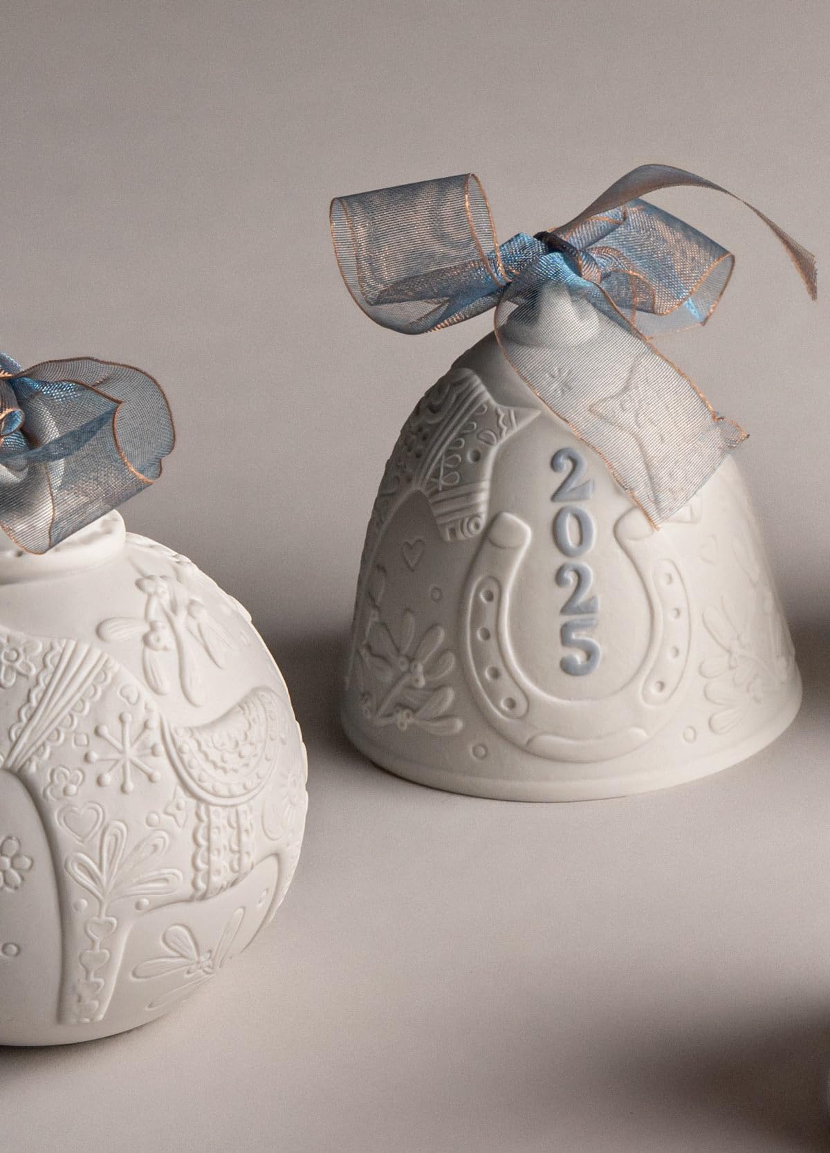 LLADRÓ Blue 2025 Christmas Bell. Decorative Ornament in Matte Porcelain with Blue Details. Porcelain Christmas Bell