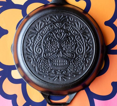 Lodge 10.25 Inch Pre-Seasoned Cast Iron Skillet - Versatile Sugar Skull Design - Ideal for Oven, Stove, Grill, or Campfire