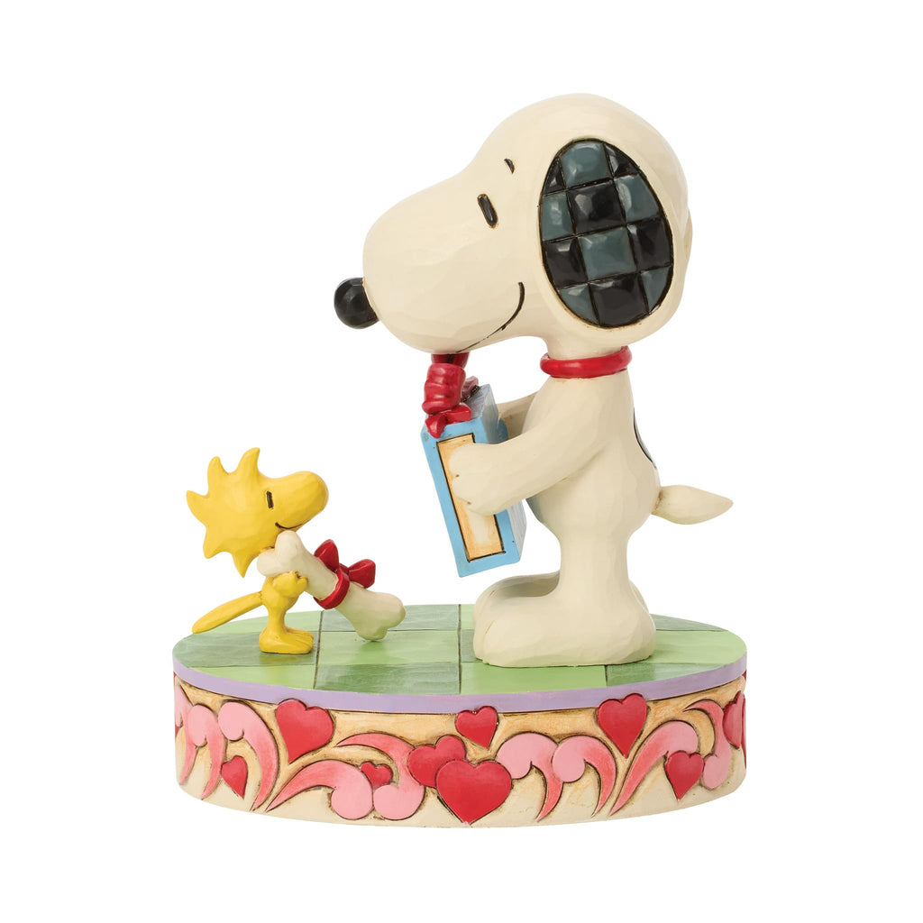 Enesco Peanuts by Jim Shore Snoopy and Woodstock with Gifts Figurine, 5.31 Inch, Multicolor