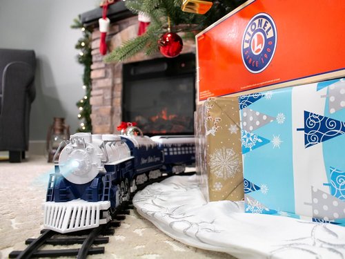 Lionel Battery-Operated Silver Bells Express Toy Train Set - Locomotive, Cars, Track & Remote with Sounds & Lights for Kids 4+