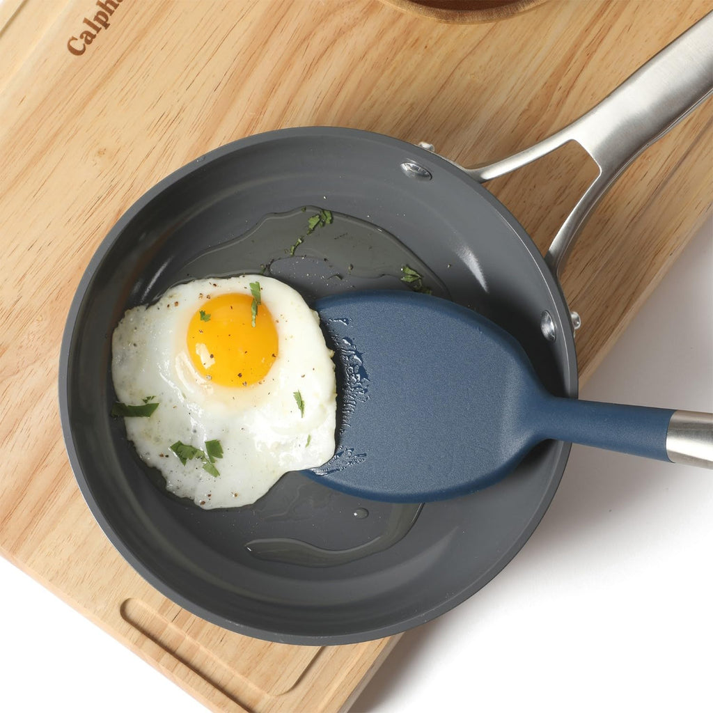 Calphalon Prime Stainless Steel Turner with Navy Blue Silicone Head, Heat Resistant Kitchen Spatula for Flipping, Cooking, Grilling, and Serving, Durable Non Scratch Cooking Utensil