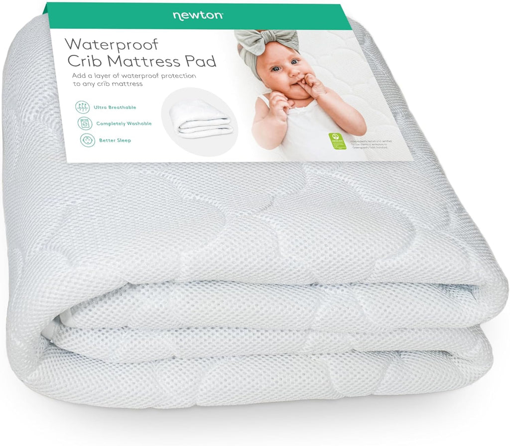 Newton Baby Waterproof Crib Mattress Pad - Ultra-Breathable Quilted Comfort | Universal Fitted Skirt | Machine Washable
