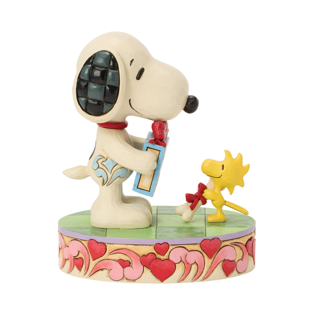 Enesco Peanuts by Jim Shore Snoopy and Woodstock with Gifts Figurine, 5.31 Inch, Multicolor