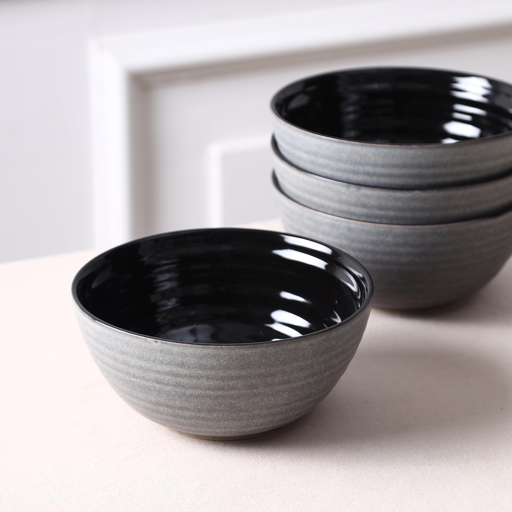 Stone Lain Dua 12-Piece Dinnerware - Stoneware, Plate and Bowls, Dishwasher and Microwave Safe, Dish Set for 4, Black