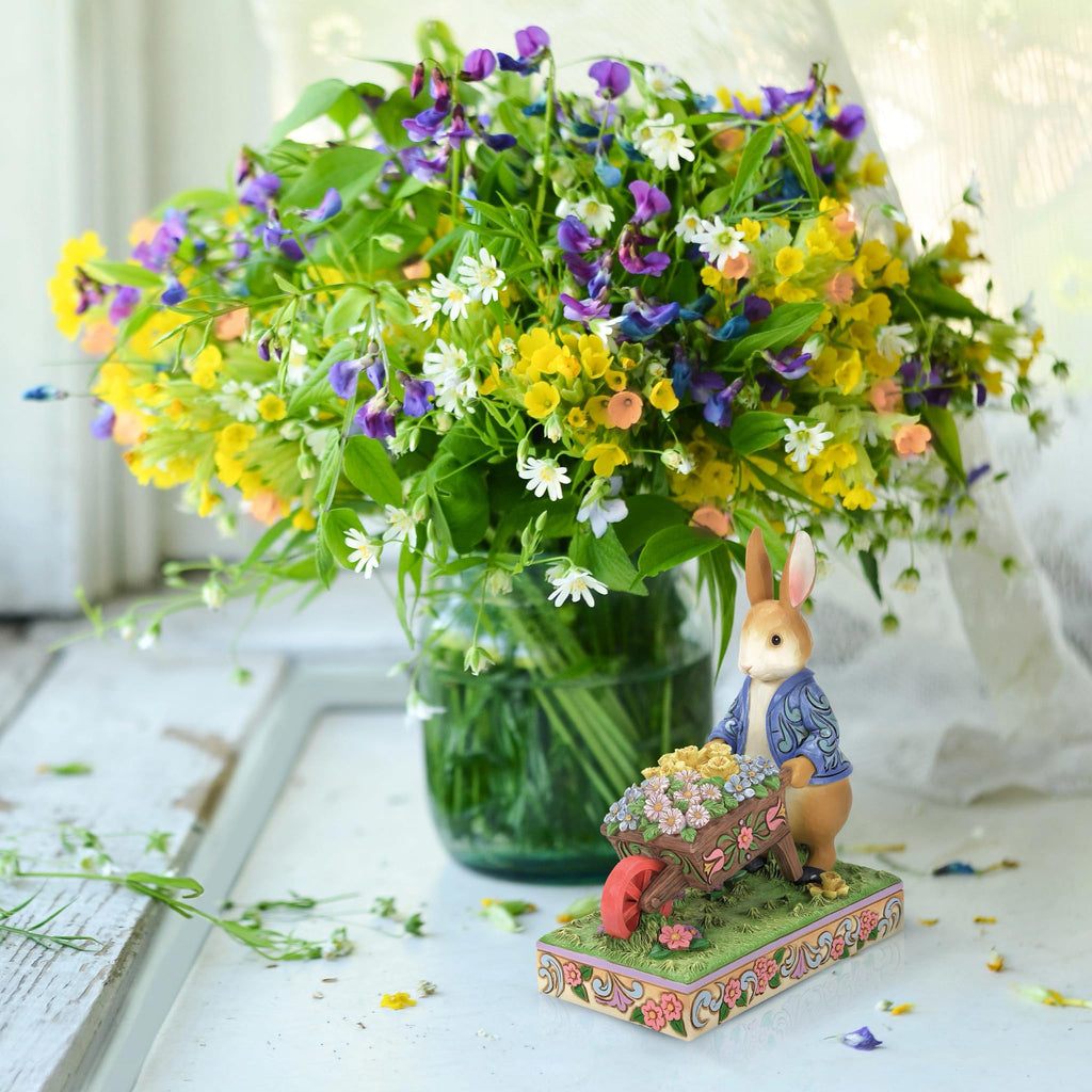 Enesco Beatrix Potter by Jim Shore Peter Rabbit with Wheelbarrow of Flowers Figurine, 6.3 Inch, Multicolor