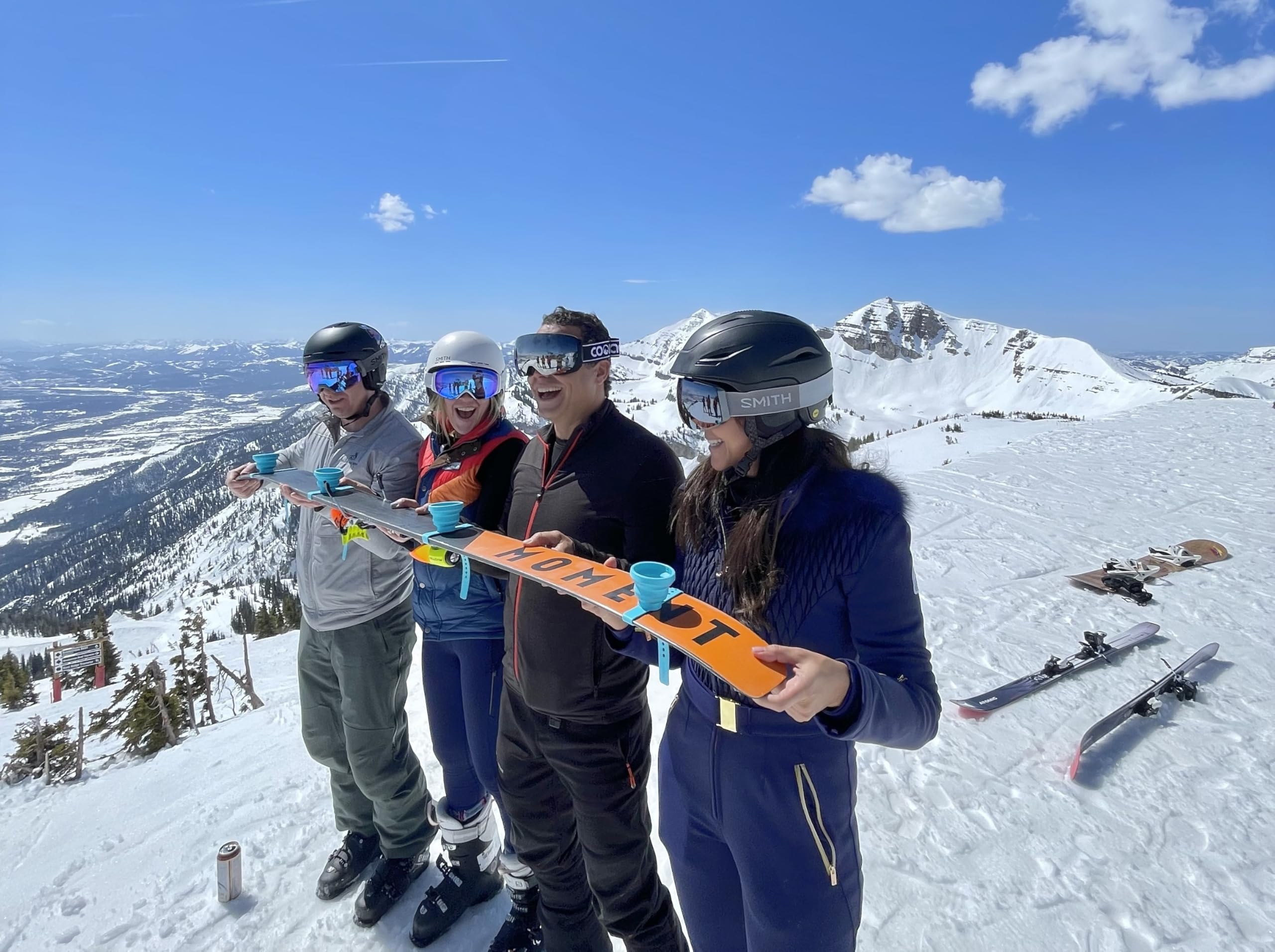 SWIGOS - Collapsible and Portable Shot Ski Kit - 4-pack w/ carrying pack. Silicone cups with an adjustable strap that turn any object into a "shot ski"