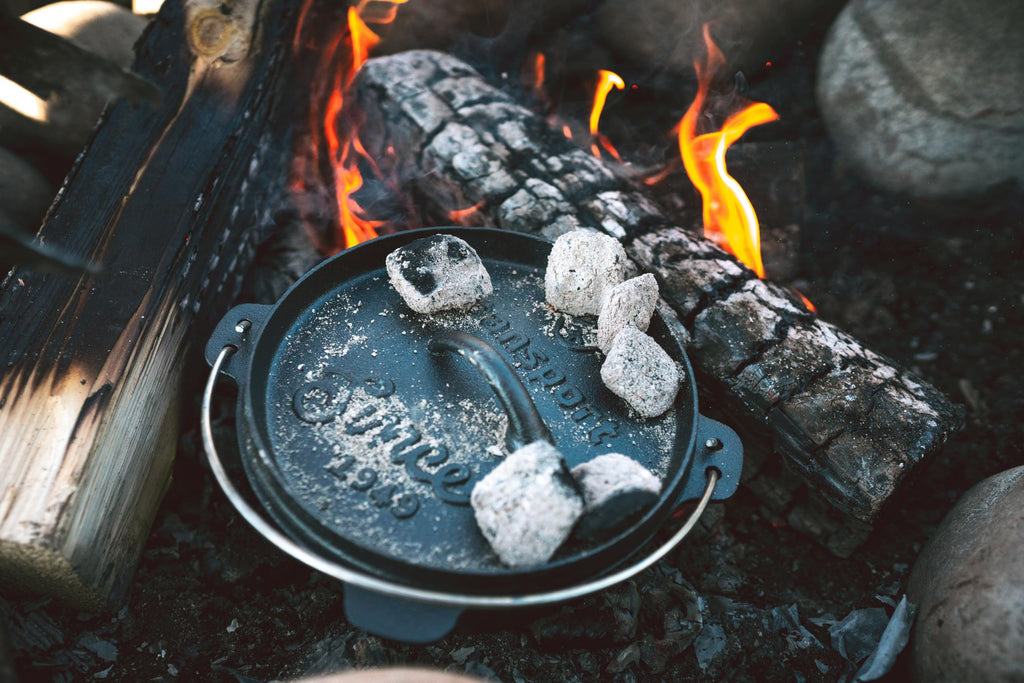 Stansport's Cast Iron Dutch Oven with Lid (16023) - Large 4 Quart Capacity, Durable Cast Iron Construction, Perfect for Outdoor Cooking, Home Kitchen and Camping Trips, Flat Bottom Design