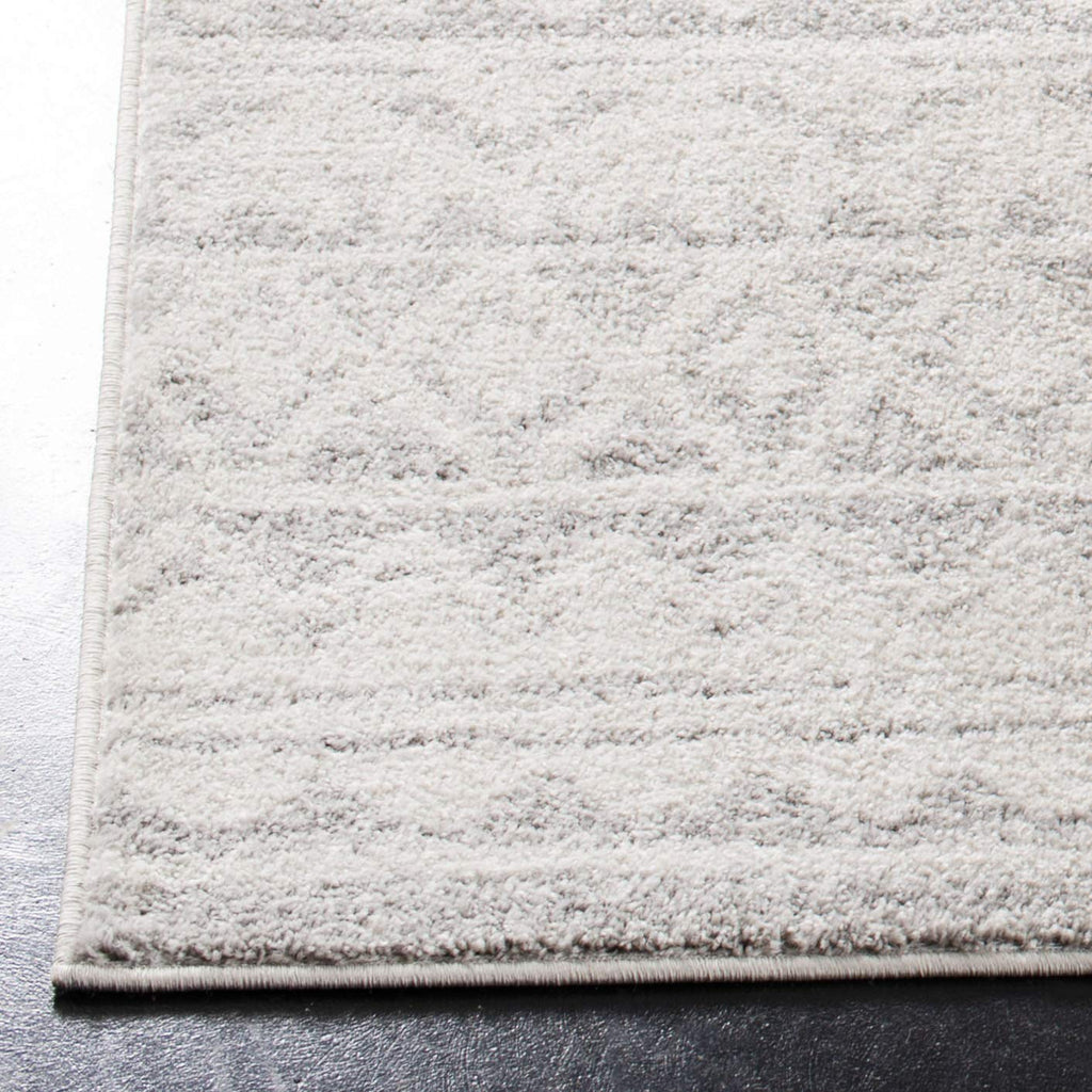SAFAVIEH Adirondack Collection Area Rug - 5'1" x 7'6", Ivory & Grey, Moroccan Boho Distressed Design, Non-Shedding & Easy Care, Ideal for High Traffic Areas in Living Room, Bedroom (ADR119B)