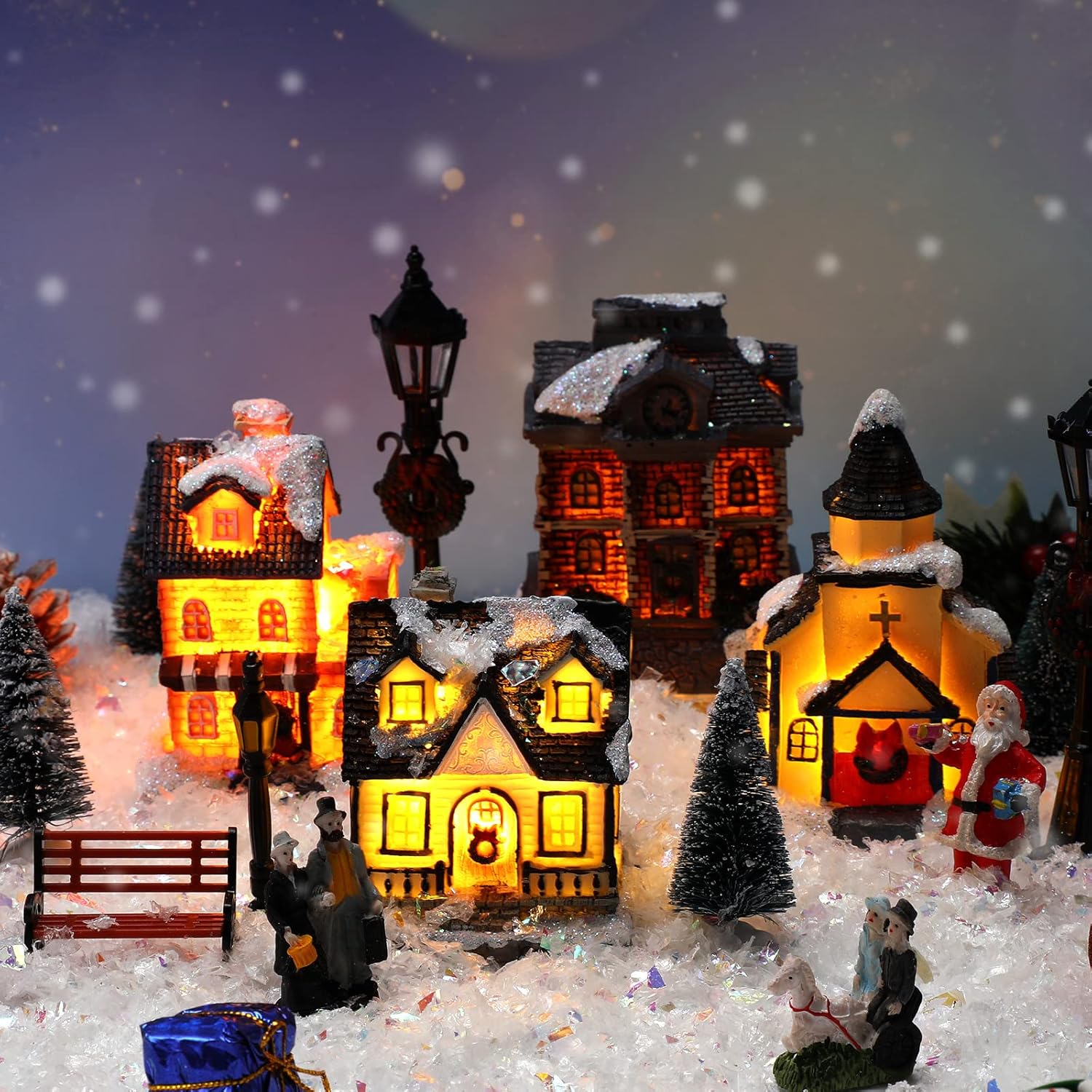 Queekay Christmas Village Set - 17 Pcs Lighted Resin Houses & Figurines | Winter Decorations for Indoor Use
