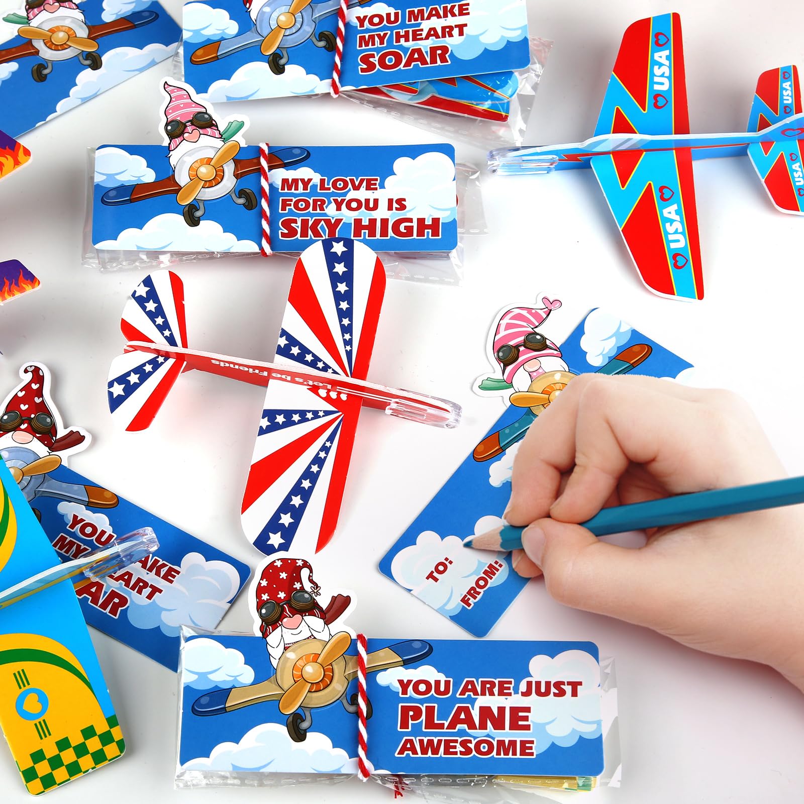 SURCVIO 28 Pack Valentines Day Gifts for Kids, Foam Airplanes Party Favor Set with Valentines Greeting Cards for Kids, Valentine's Day School Prize Party Favor, Classroom Exchange Gift Set