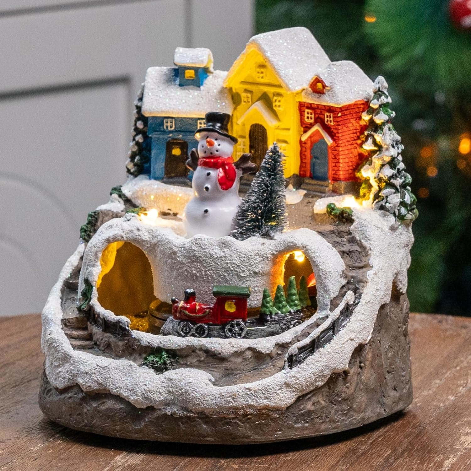 MXwcy Christmas Village House - Moving Train & Music, Lighted Snowman Figurine with 8 Holiday Songs, LED Lights