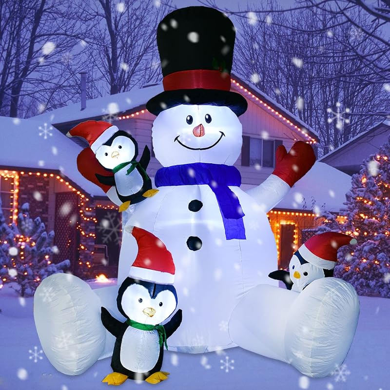 7 ft Lighted Christmas Inflatable Snowman with Three Penguins - Outdoor Holiday Yard Decor