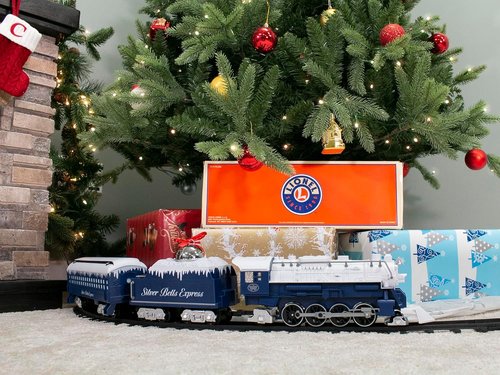 Lionel Battery-Operated Silver Bells Express Toy Train Set - Locomotive, Cars, Track & Remote with Sounds & Lights for Kids 4+