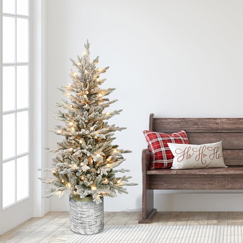 Puleo International 4.5 ft Pre-Lit Potted Flocked Arctic Fir Christmas Tree - 70 Clear Lights, 419 Tips