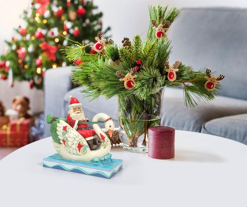 Enesco Jim Shore Heartwood Creek Santa Riding a Swan Figurine, 6.89 Inch, Multicolor