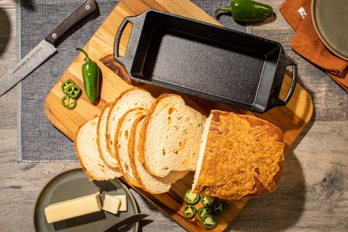 Lodge 10 Inch Pre-Seasoned Cast Iron Loaf Pan - Dual Handles - Unparalleled Heat Retention for Consistent, Even Baking - Black