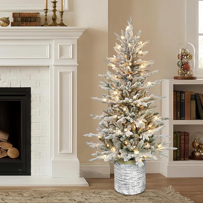 Puleo International 4.5 ft Pre-Lit Potted Flocked Arctic Fir Christmas Tree - 70 Clear Lights, 419 Tips