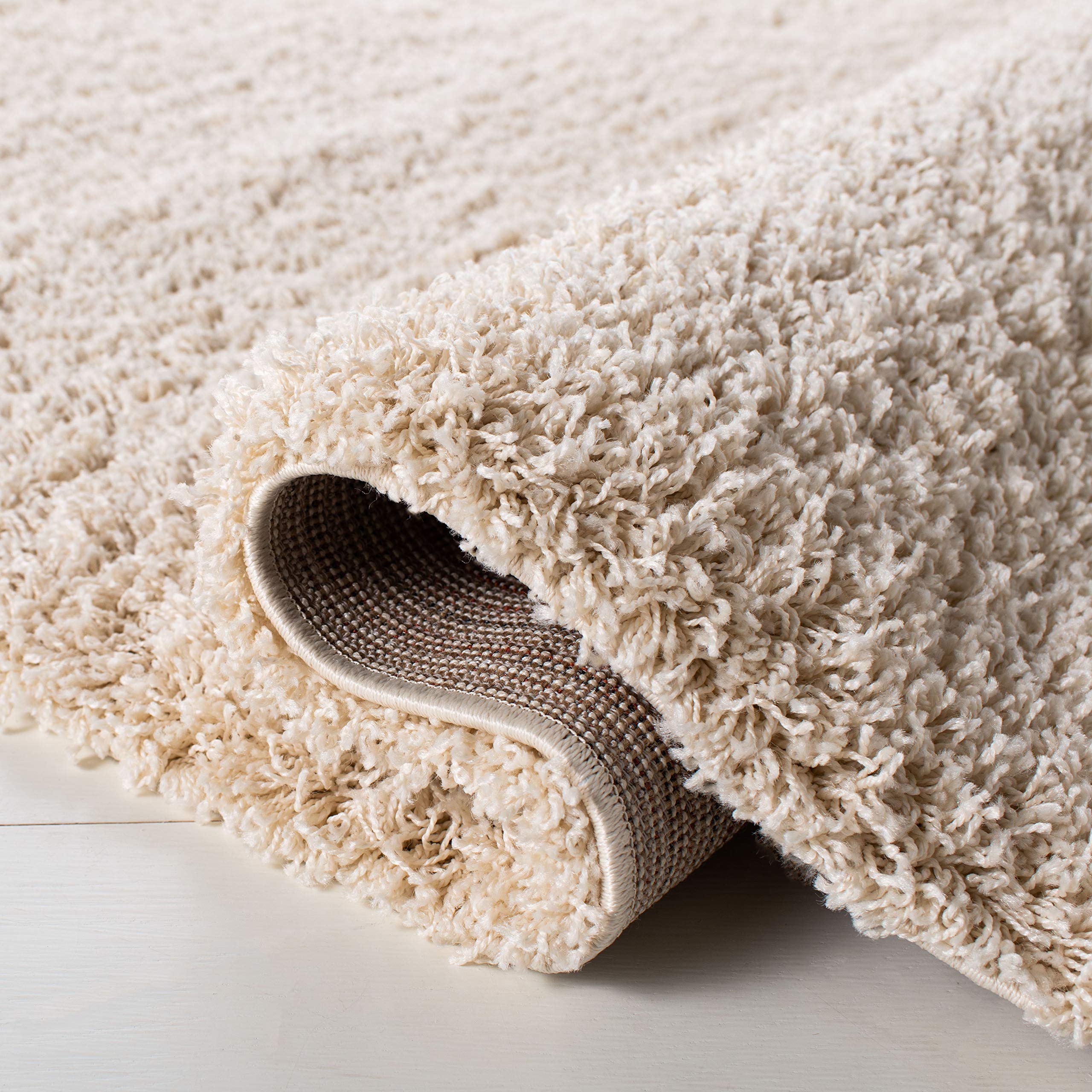 SAFAVIEH Laguna Shag Collection Accent Rug - 2'3" x 4', Beige, Solid Design, Non-Shedding & Easy Care, 2-inch Thick Ideal for High Traffic Areas in Entryway, Living Room, Bedroom (SGL303B)