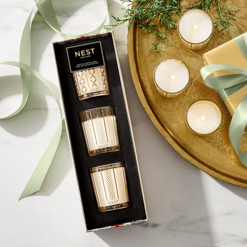 NEST New York Festive Scented Votive Christmas Candle Trio - 2 oz Each - Includes Holiday, Birchwood Pine, Crystallized Ginger & Vanilla Bean - Up to 28-Hour Burn Time - Reusable Glass Vessel