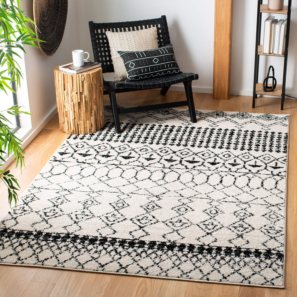 SAFAVIEH Area Rug 6x9 - Tulum Collection - Ivory & Black, Moroccan Boho Distressed Design, Non-Shedding & Easy to Clean, Ideal for Living Room, Bedroom, Dining Space (TUL229B)